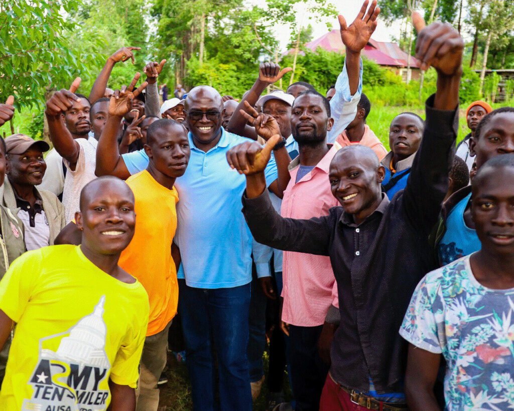 an image showing humphrey muchuma with various people