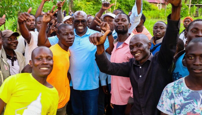 an image showing humphrey muchuma with various people