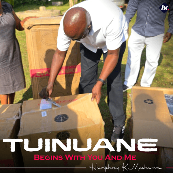 Tuinuane-Mindset-Why-Real-Progress-Begins-With-All-of-Us-2025-humphrey muchuma preparing gifts